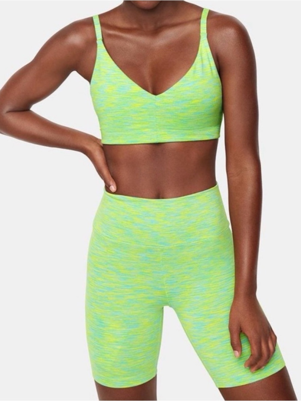 Outdoor Voices Spacedye green sports bra and biker shorts set